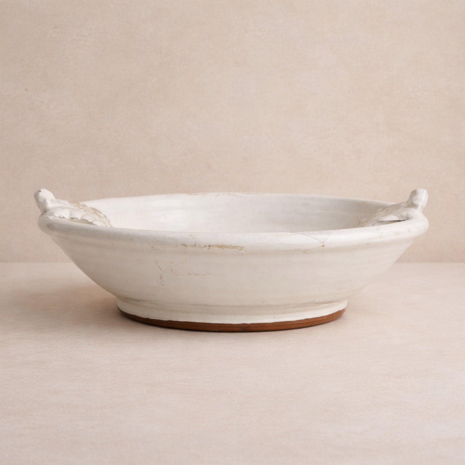 Leaf Handle Ceramic Bowl — Transient White